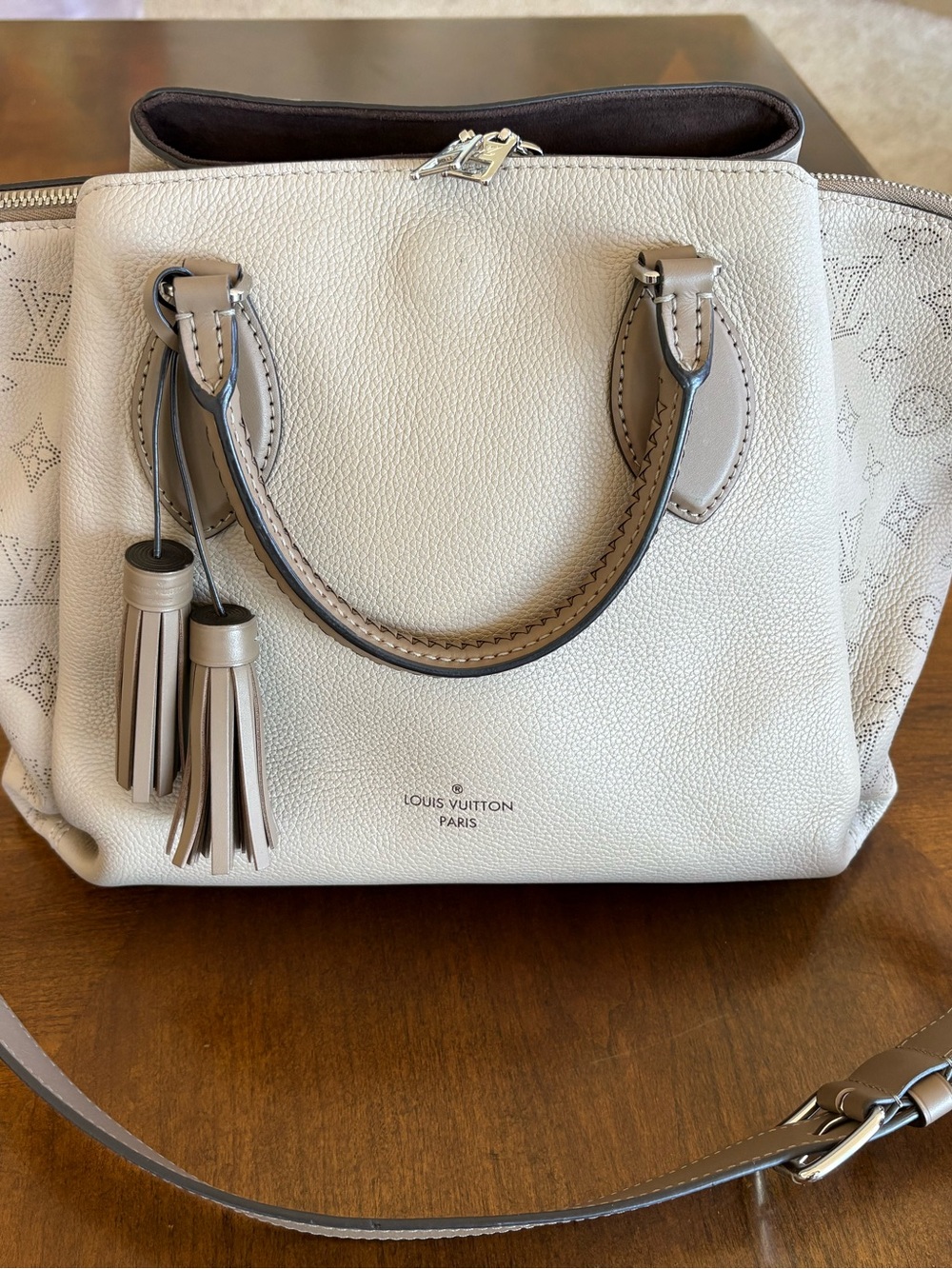 Authentic Louis Vuitton Haumea Mahina bag in Galet beige. Used only once